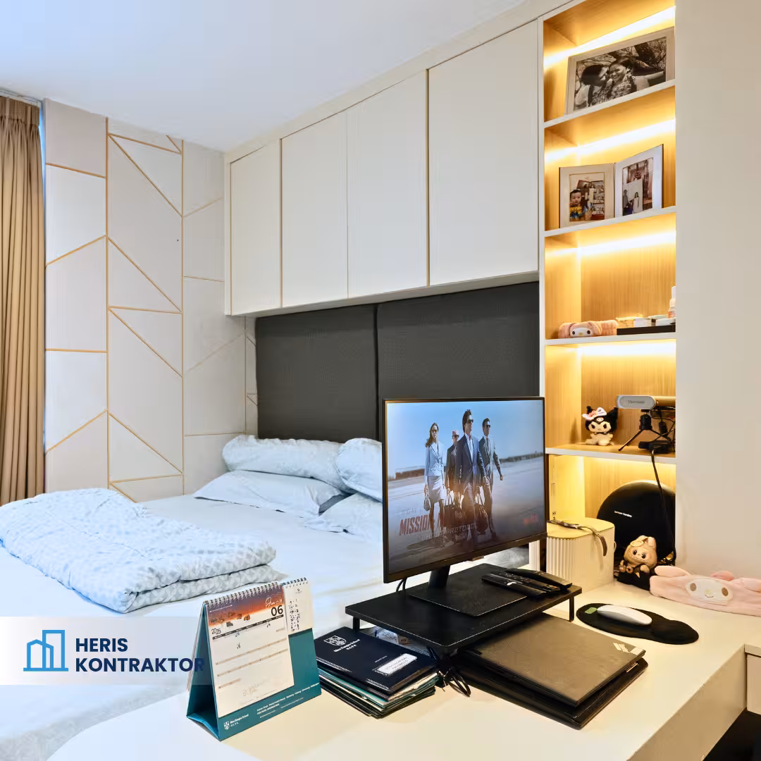 Desain interior apartemen modern dengan meja kerja, kabinet putih, dan rak kayu berlampu LED.